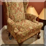 F27. Wing back chair with tapestry fabric. 45”h x 31”w x 32”d 